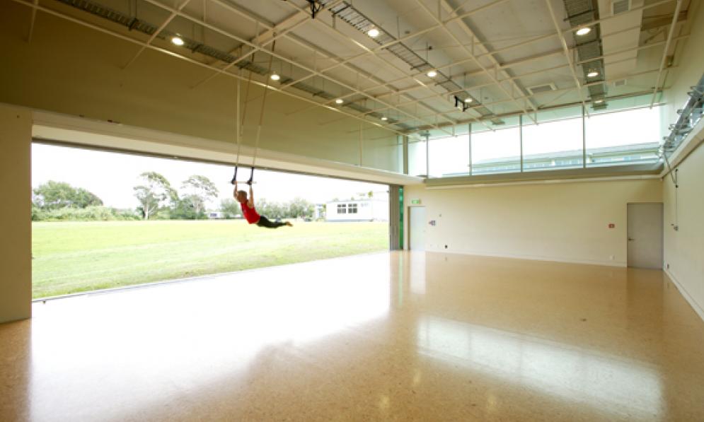 Large studio with person on rings