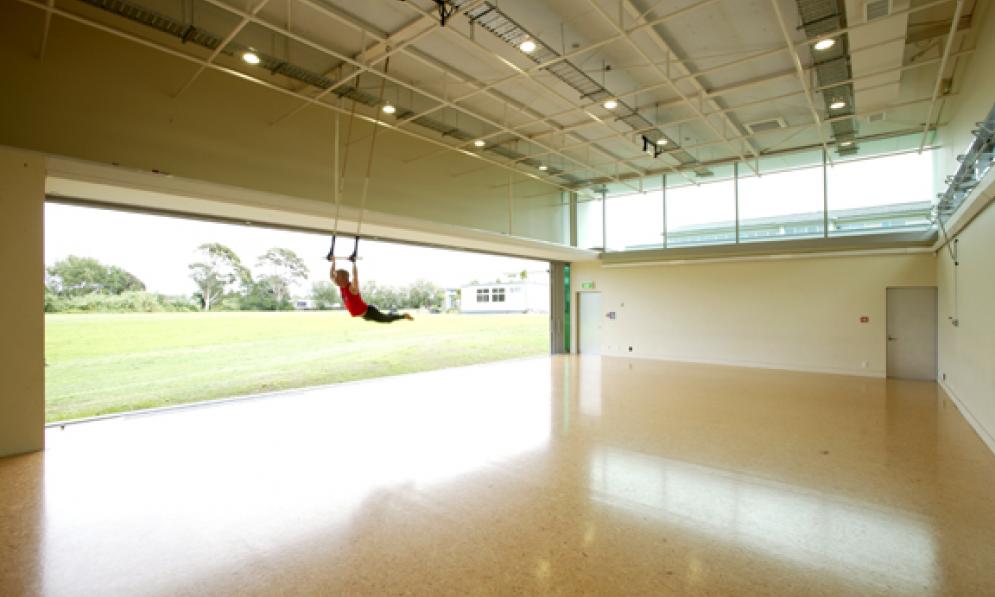 Large studio with person on rings