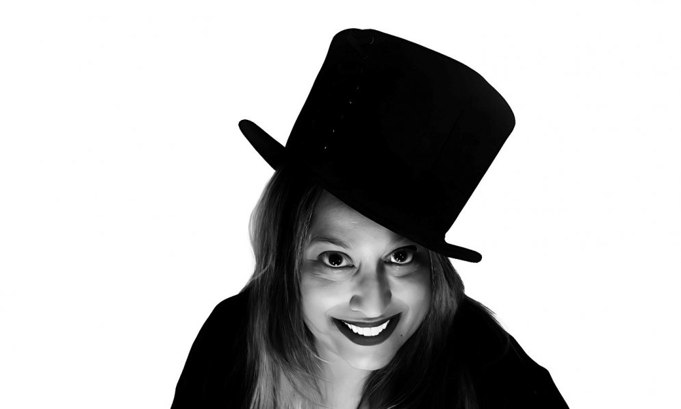 Sharu Delilkan Wearing Top Hat
