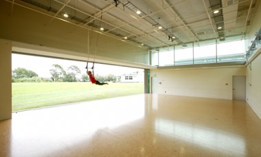 Large studio with person on rings